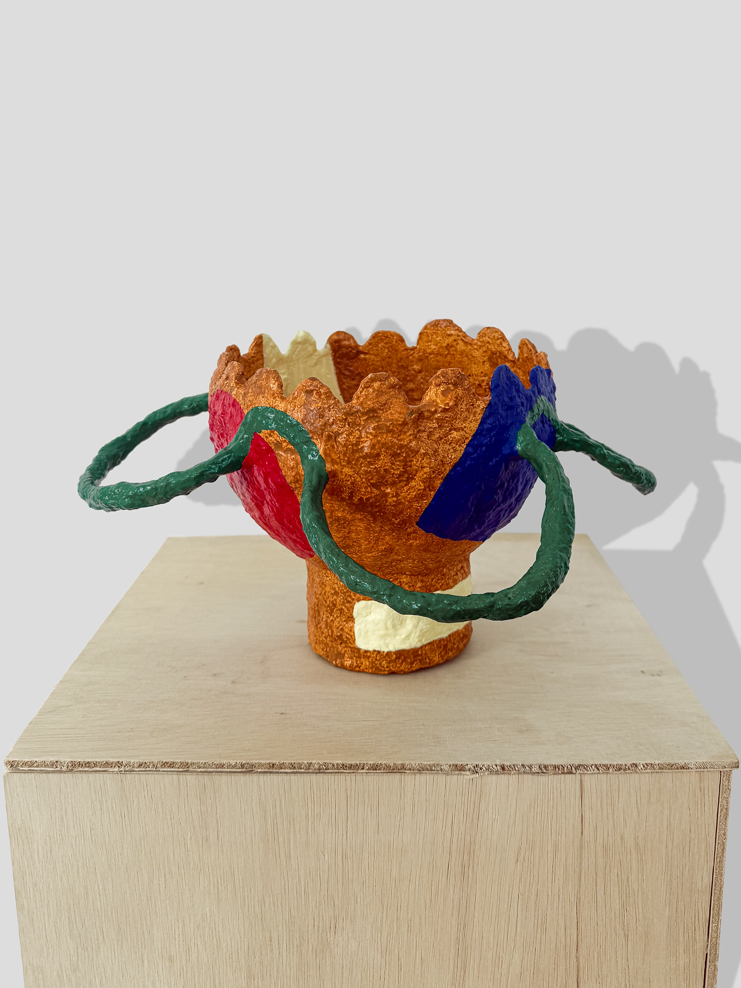 Papier mâché bowl with irregular handles