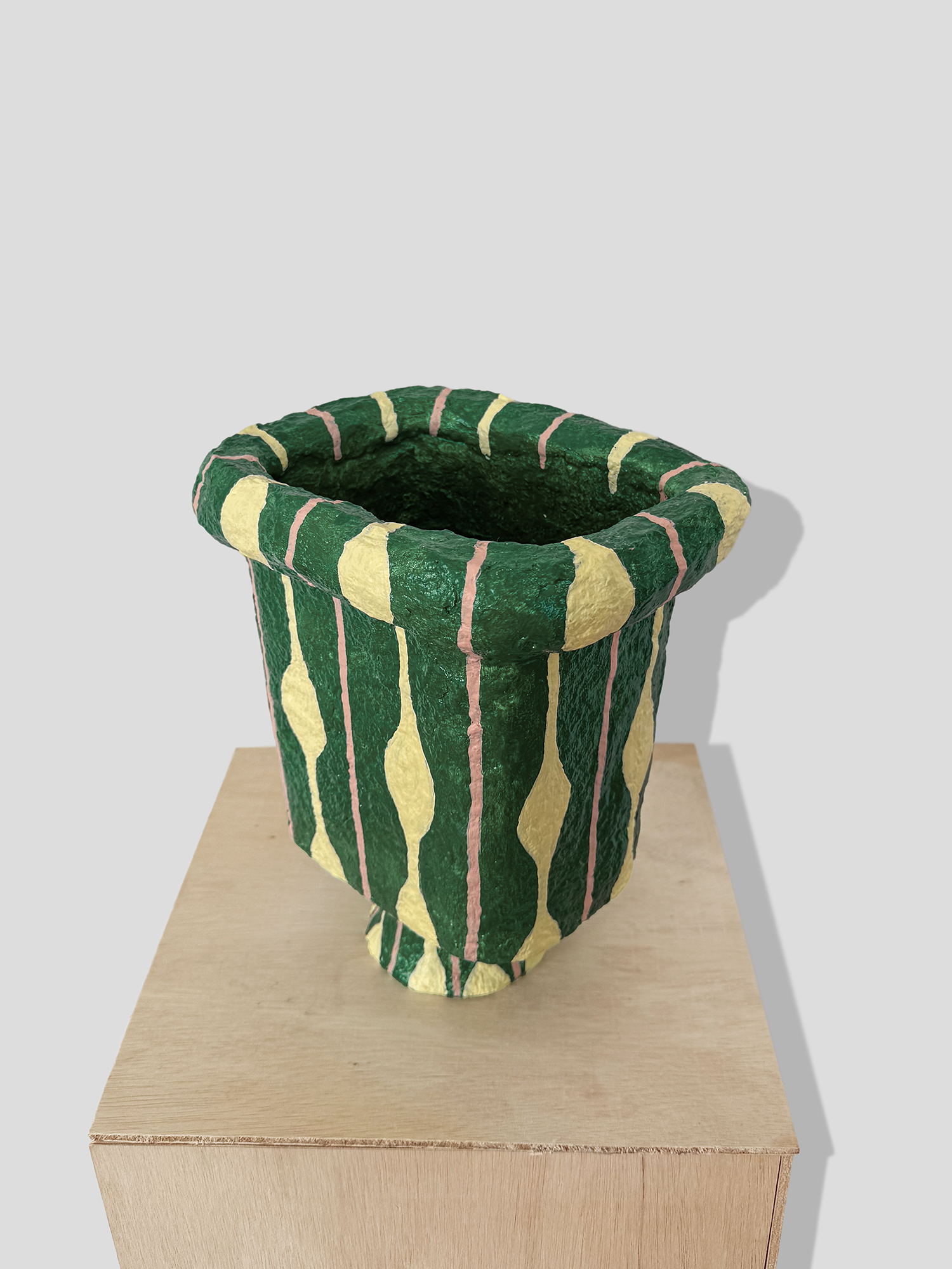 Papier mâché urn with stand and irregular edge