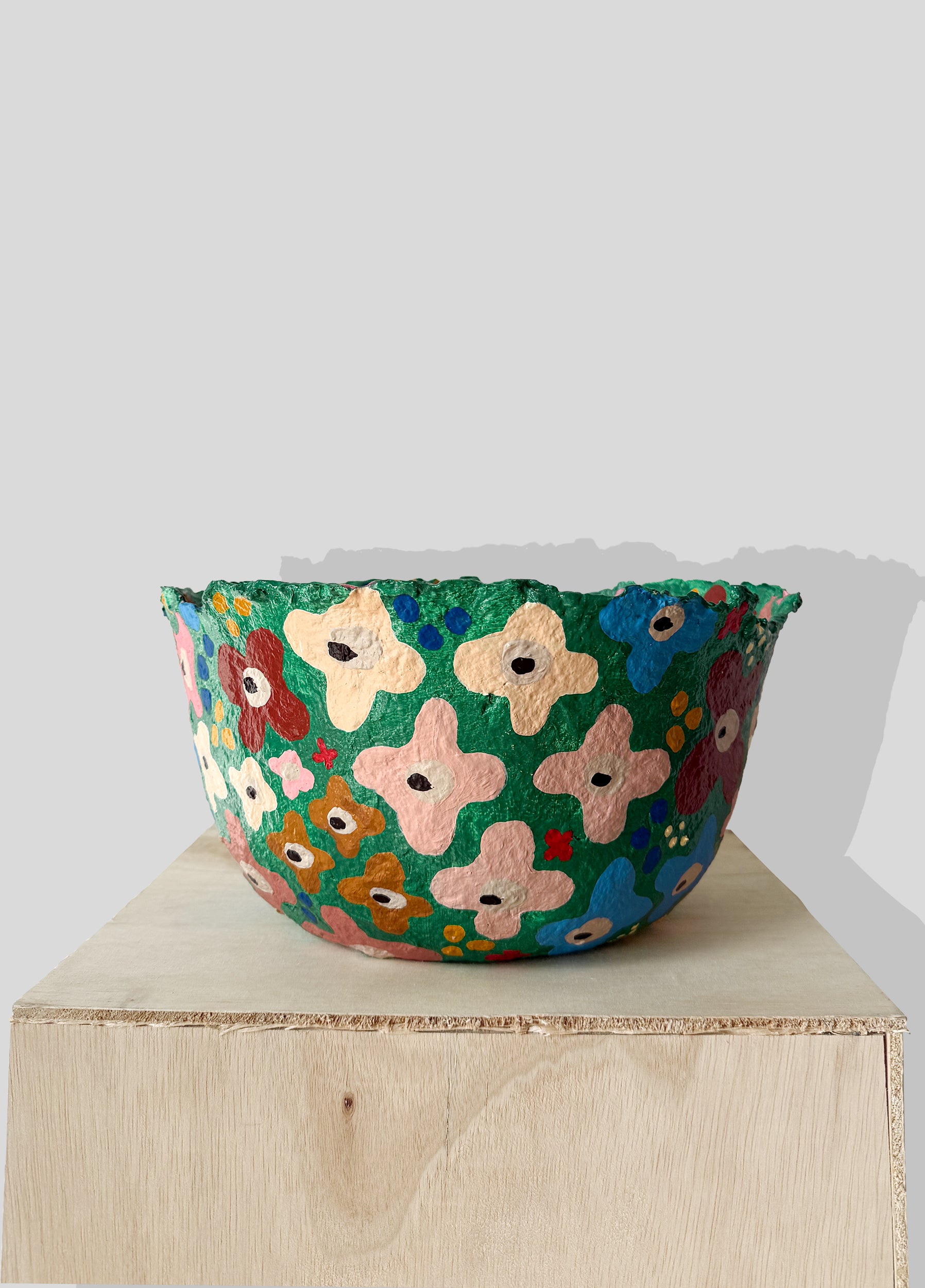 Fruit bowl with flower design and raw edge