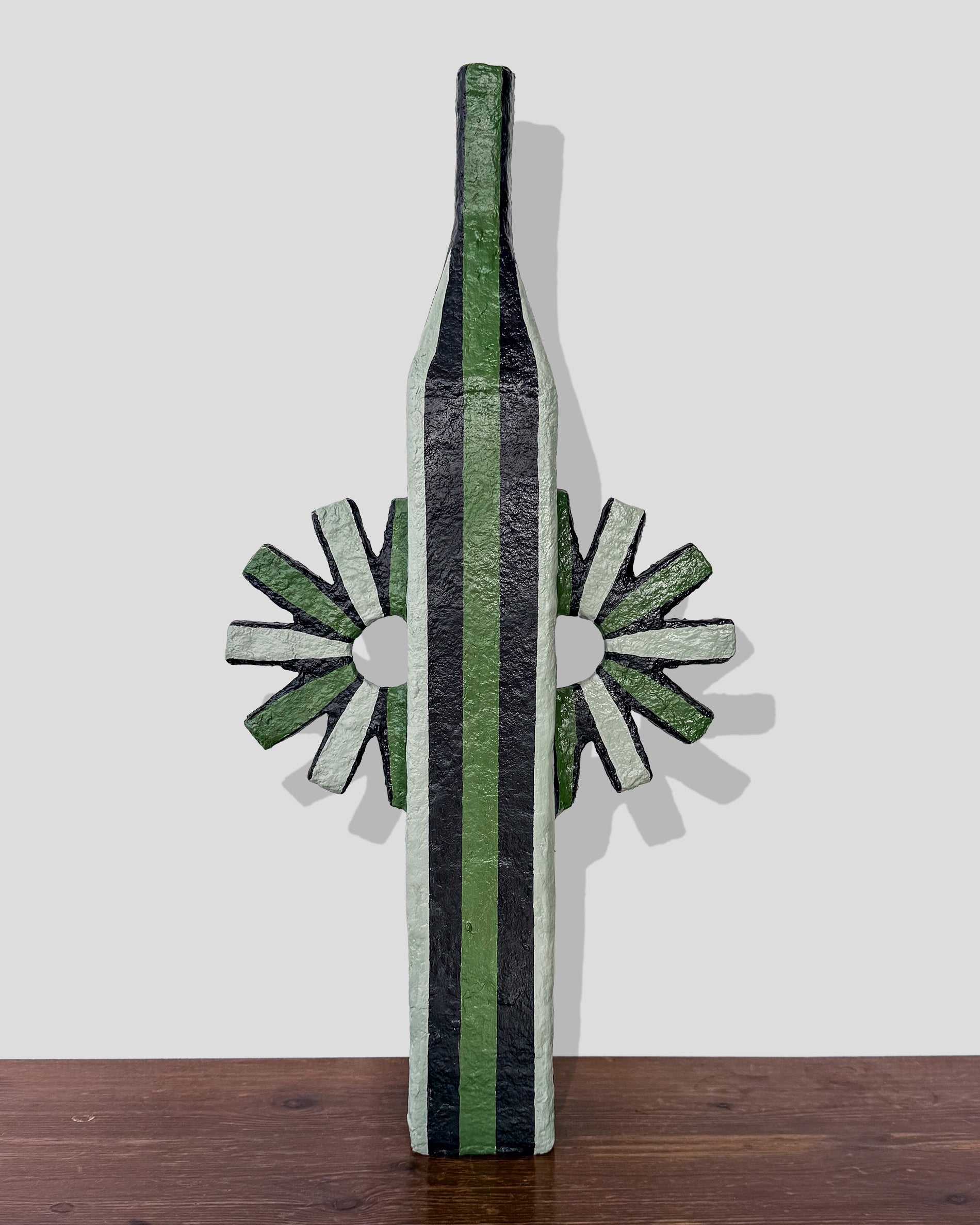 A hand-painted paper pulp vase with geometric pattern created by artist Meritxell Claverol