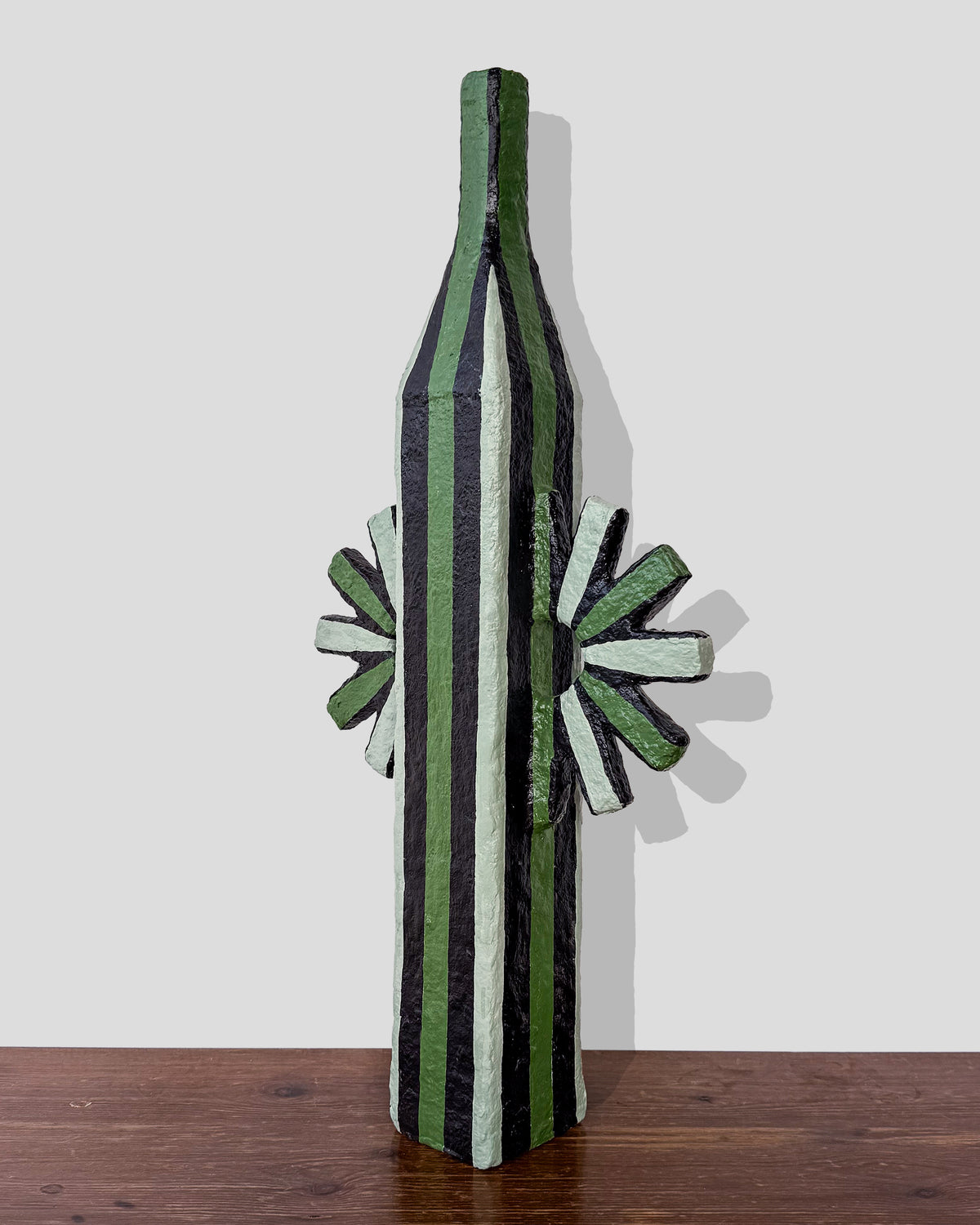 A hand-painted paper pulp vase with geometric pattern created by artist Meritxell Claverol