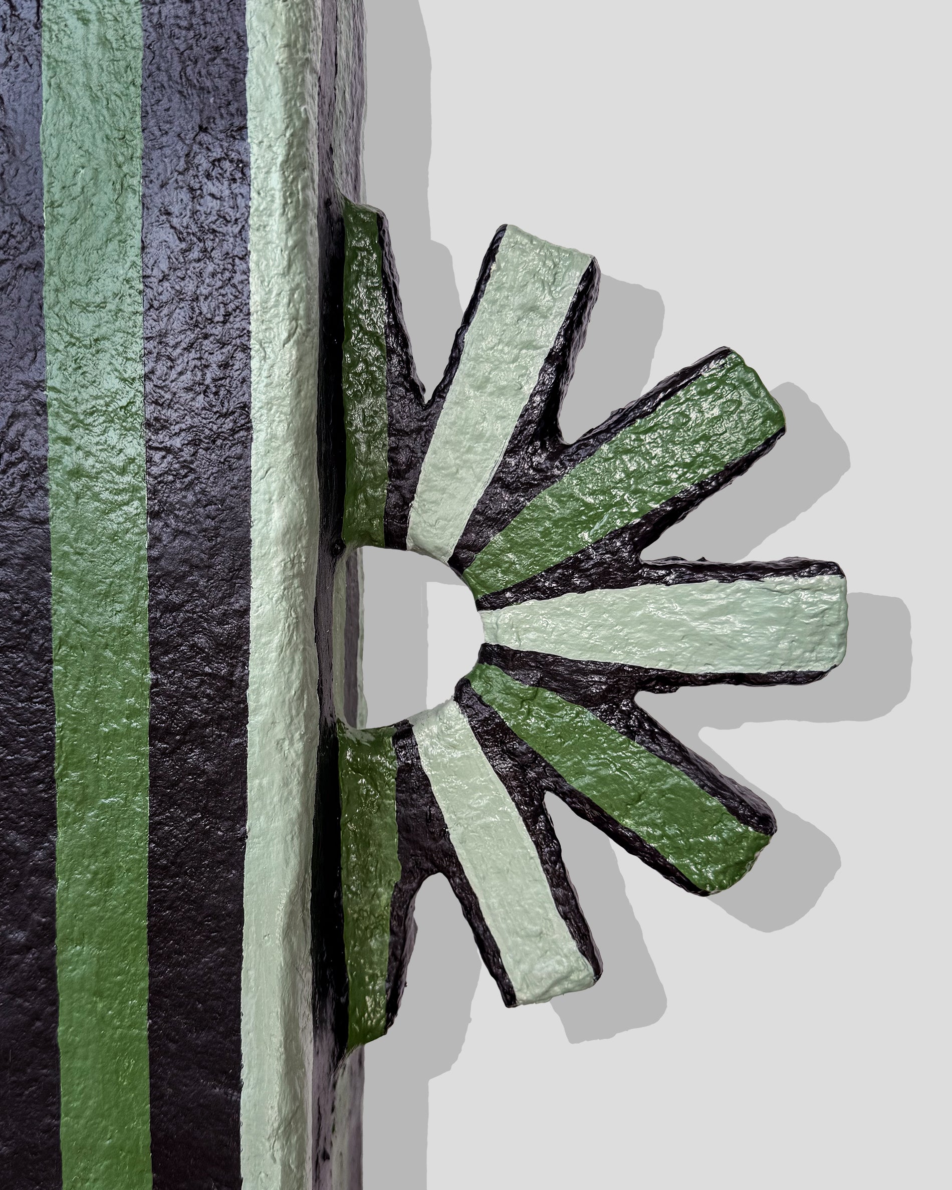 A hand-painted paper pulp vase with geometric pattern created by artist Meritxell Claverol