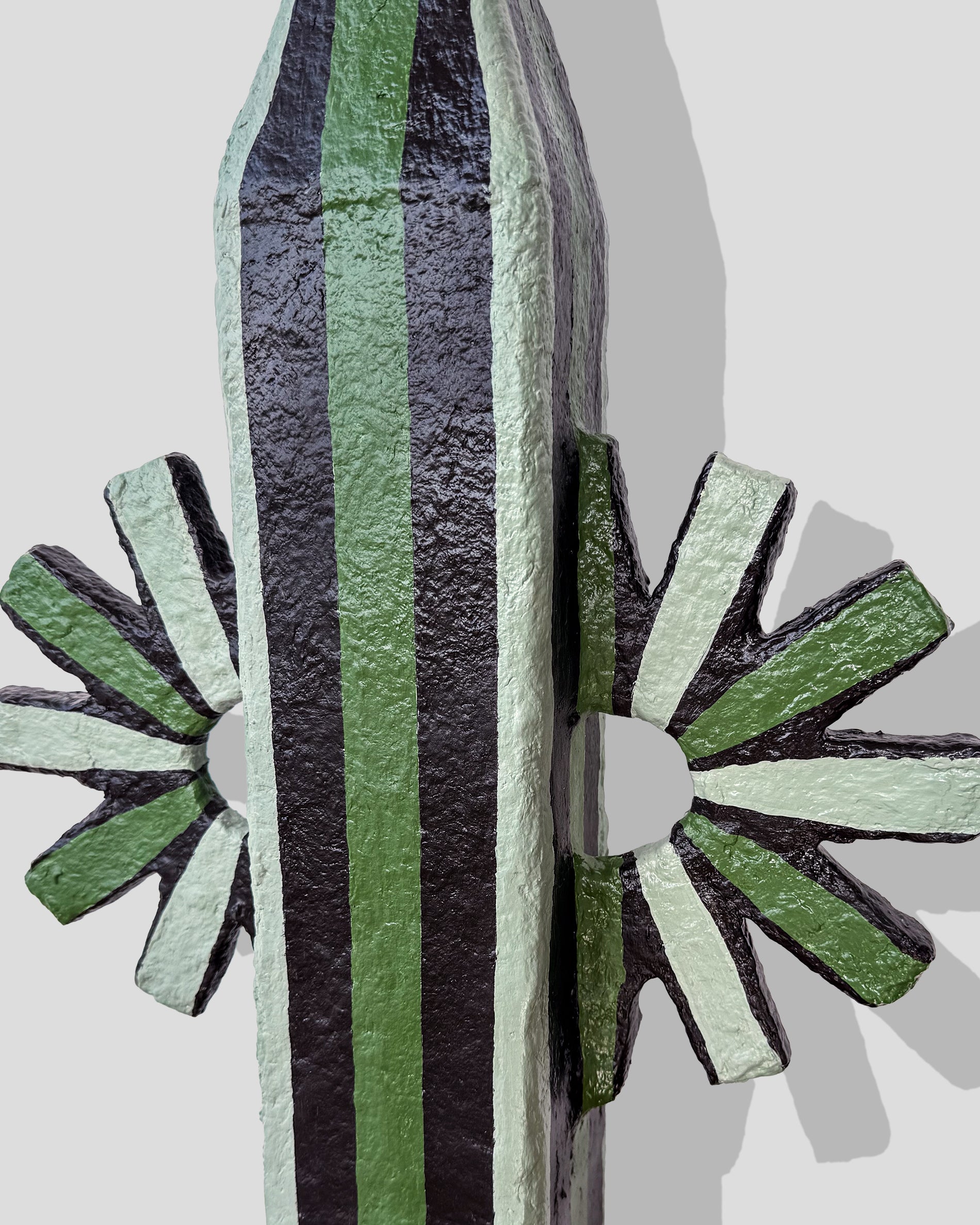 A hand-painted paper pulp vase with geometric pattern created by artist Meritxell Claverol