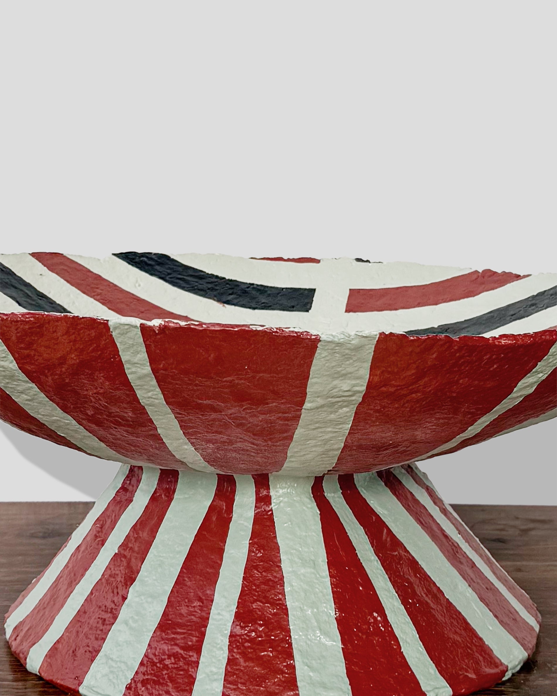 A hand-painted paper pulp vase with geometric pattern created by artist Meritxell Claverol