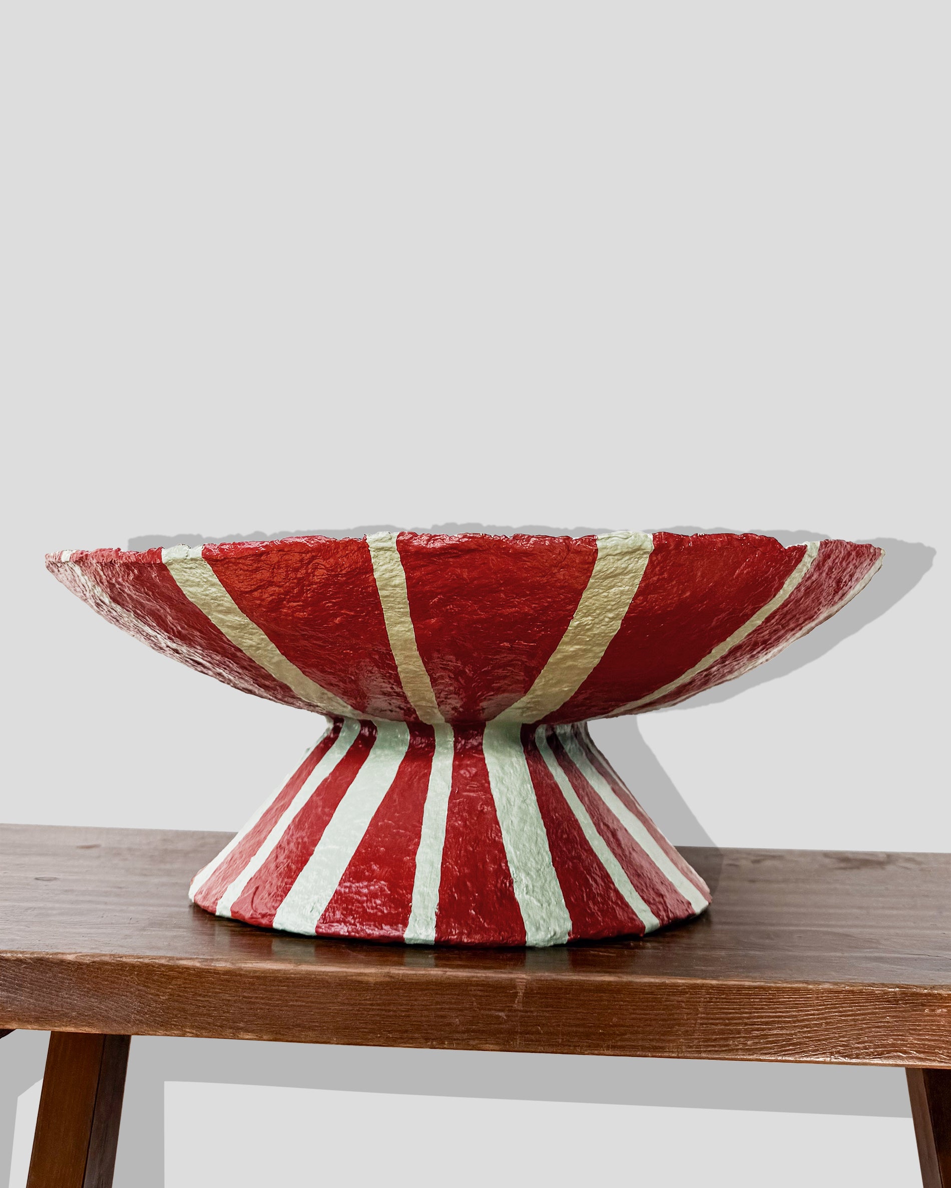 A hand-painted paper pulp vase with geometric pattern created by artist Meritxell Claverol