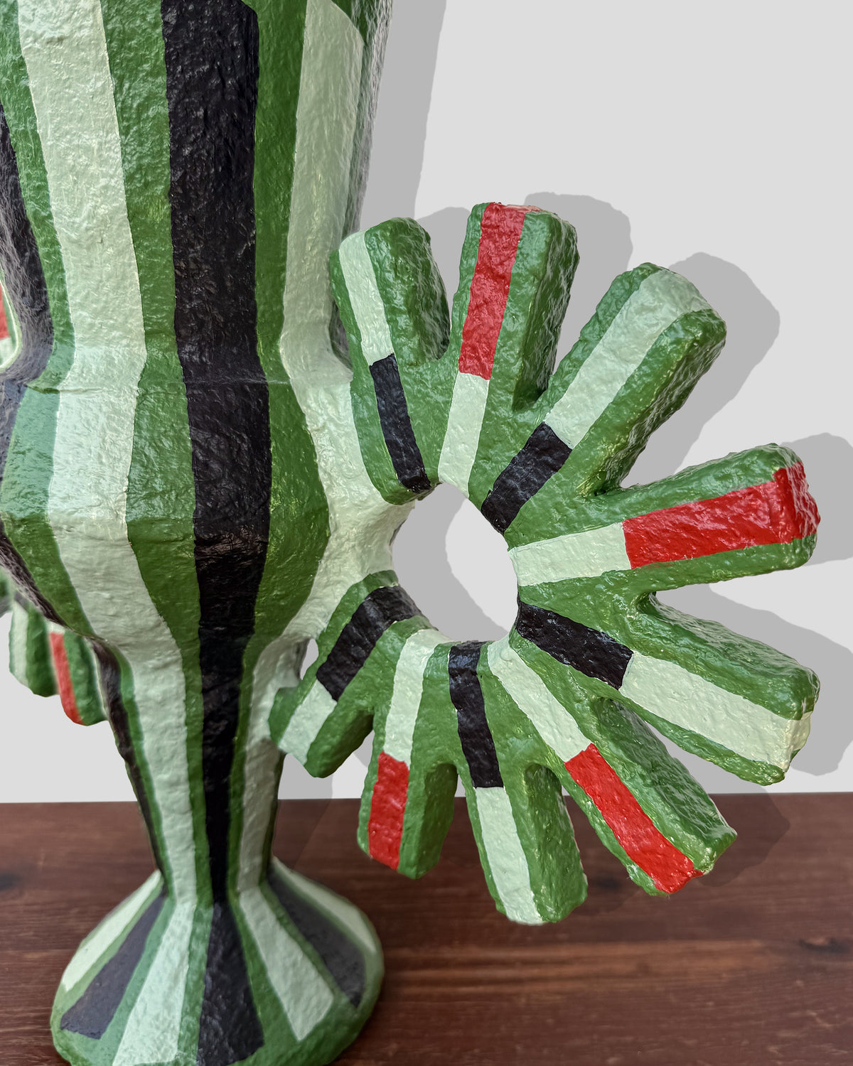 A hand-painted paper pulp vase with geometric pattern created by artist Meritxell Claverol