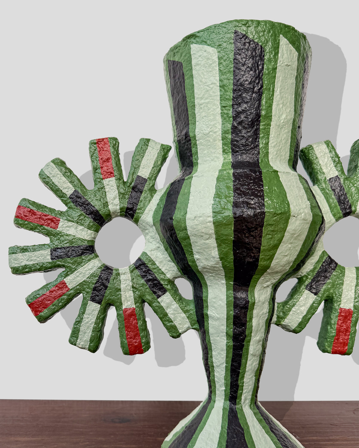A hand-painted paper pulp vase with geometric pattern created by artist Meritxell Claverol