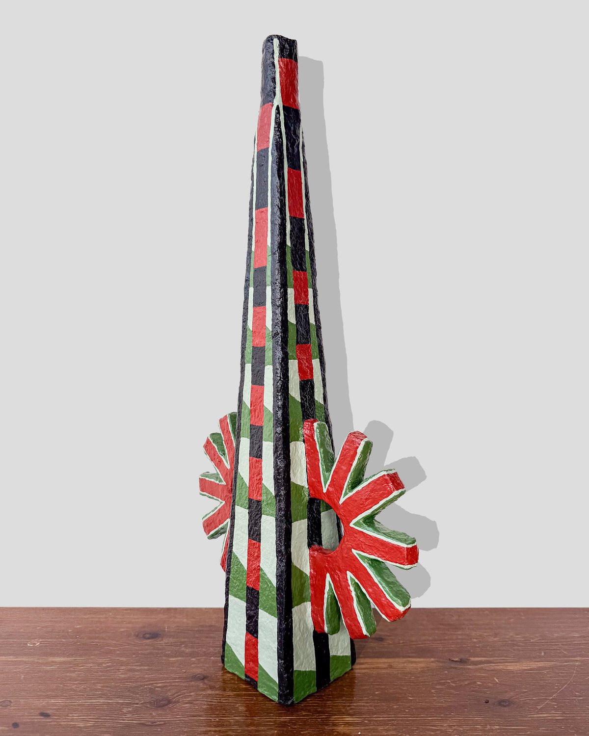 A hand-painted paper pulp vase with geometric pattern created by artist Meritxell Claverol