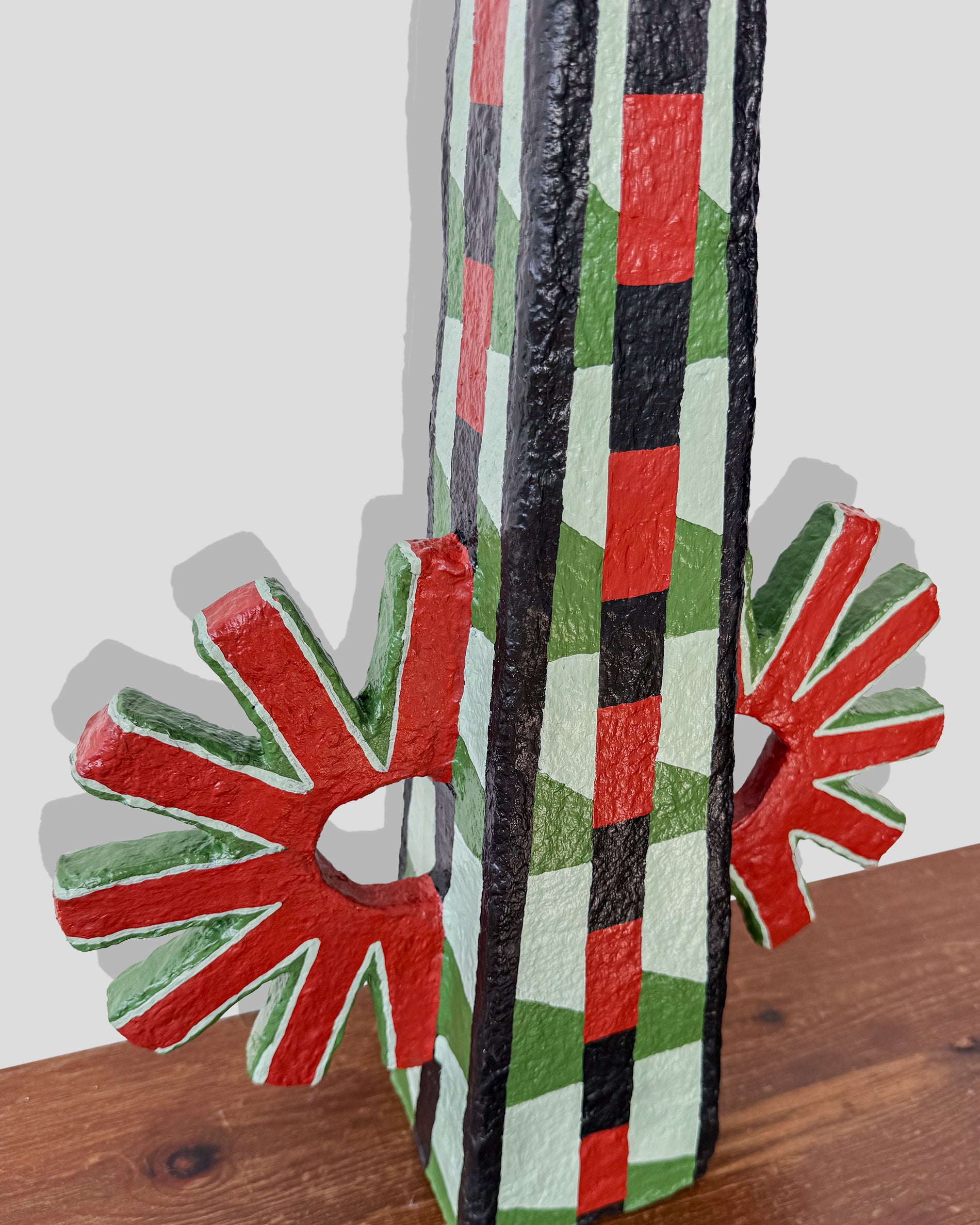 A hand-painted paper pulp vase with geometric pattern created by artist Meritxell Claverol