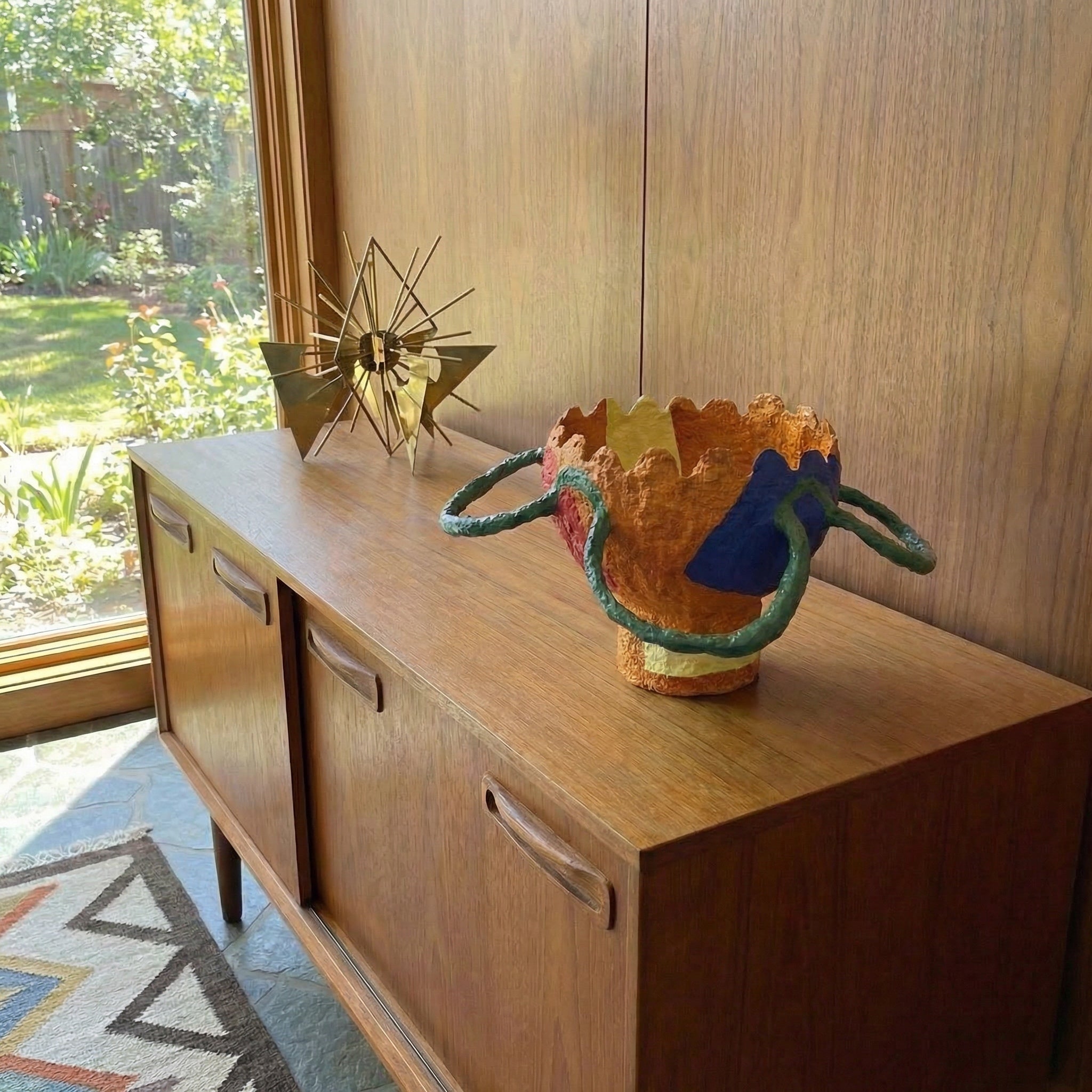 Papier mâché bowl with irregular handles