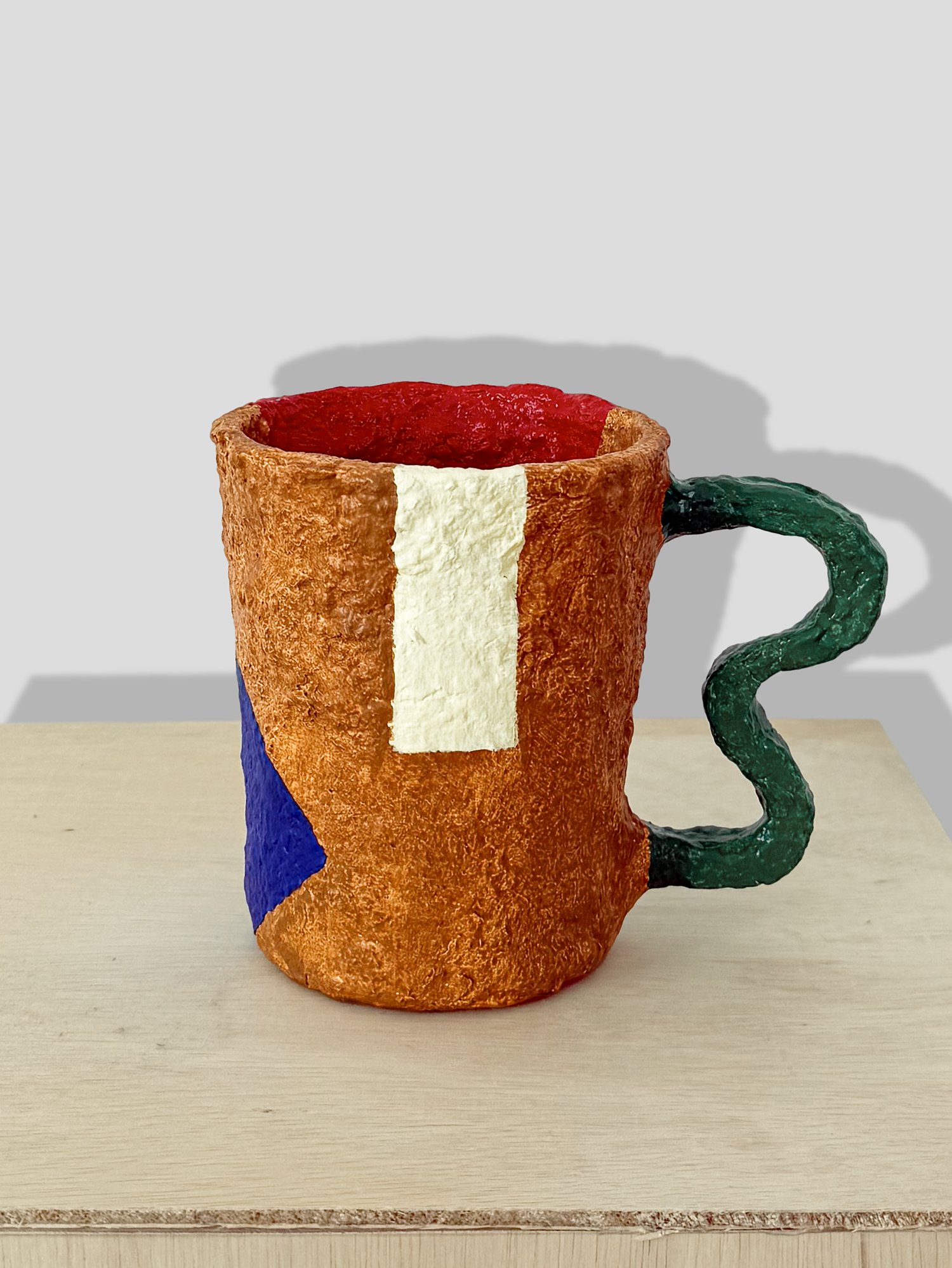 Papier mâché small vase with irregular handle