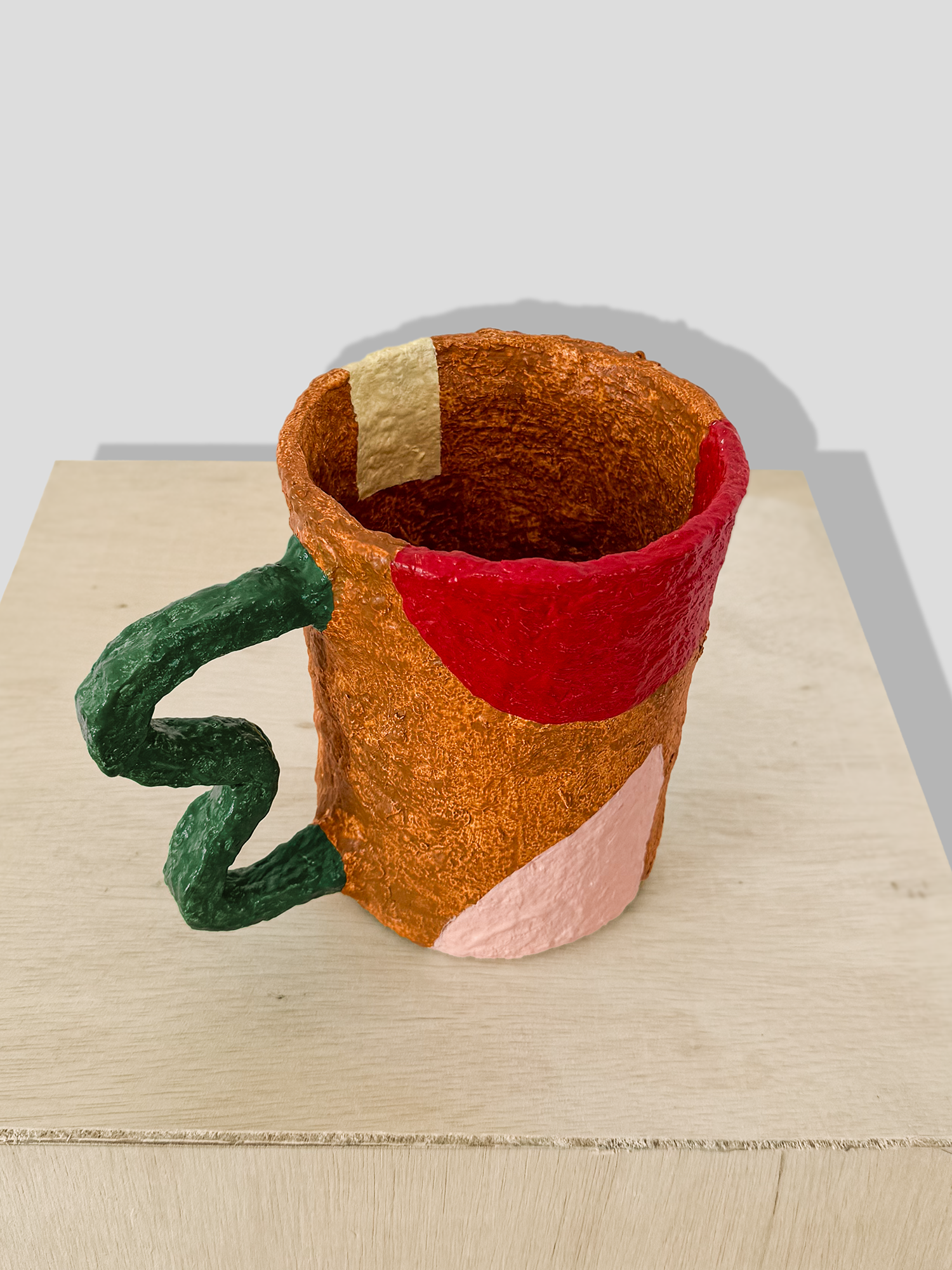 Papier mâché small vase with irregular handle